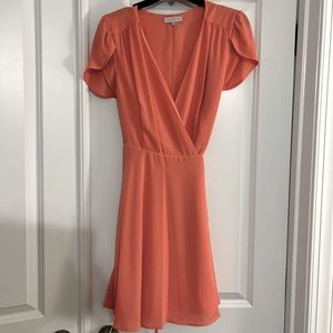 1. State wrap dress with tulip sleeves. Coral color, size M.